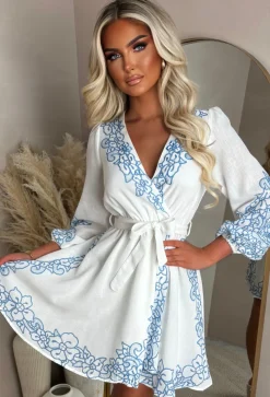 Elegance Unveiled Blue Embroidered Flower Wrap Front Dress