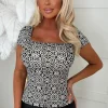 Sweet & Sleek Black White Geometric Stretch Short Sleeve Top