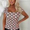 Sweet & Sleek Coral Geometric Stretch Short Sleeve Top